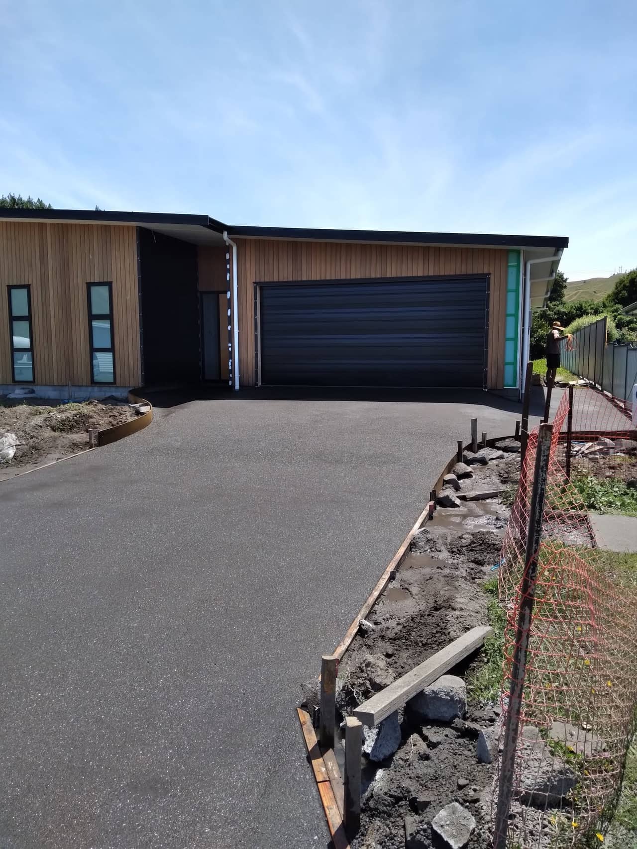 Exposed aggregate concrete driveway in Gisborne by Eastcrete Solutions