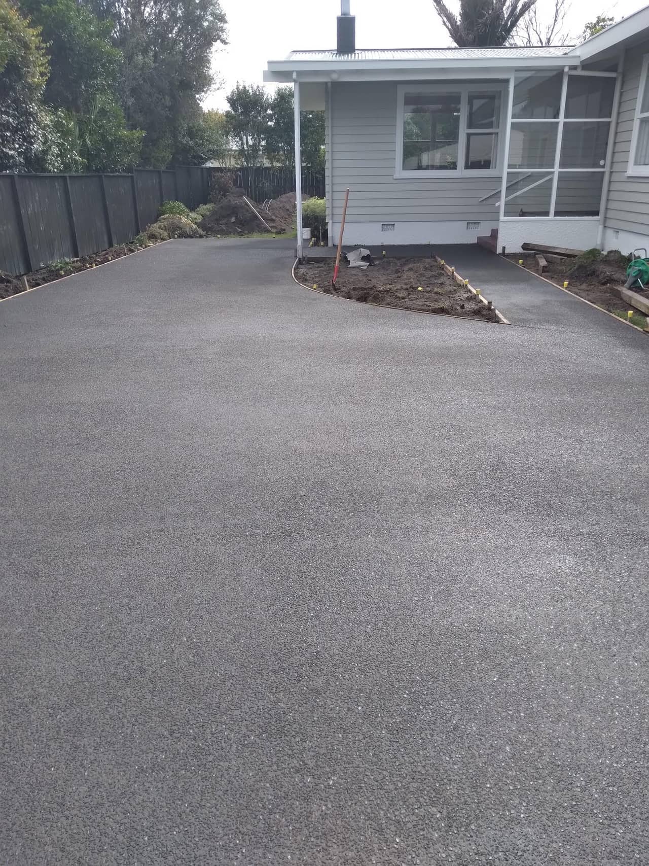 Exposed aggregate concrete driveway at a Gisborne home, laid by Eastcrete Solutions