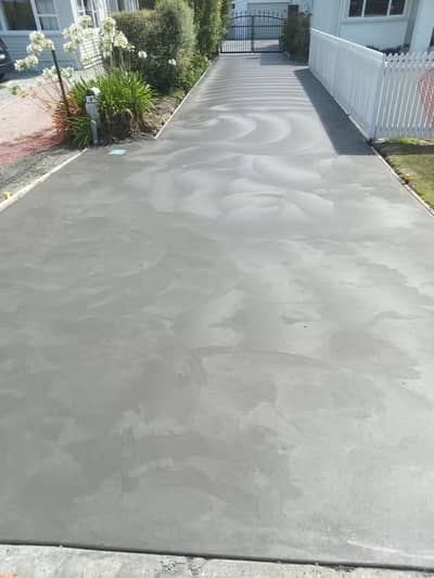 Decorative swirl trowel finish on concrete at a Gisborne property